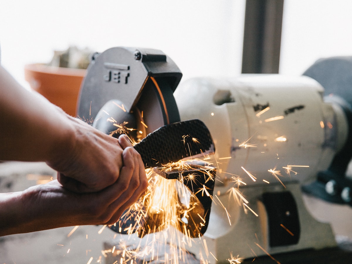 Cold saw cutting metal with sparks