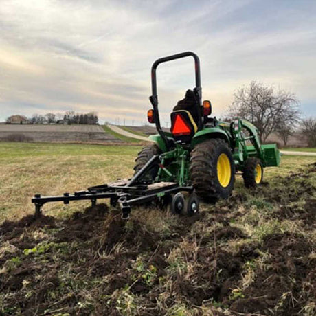 GreyWolf Till-N-Claw 3-point 60 in., behind a compact tractor